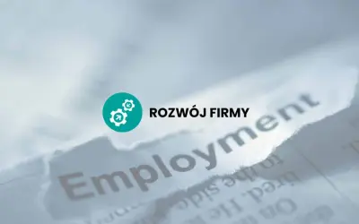 Rozwój firmy i prawa pracodawcy. Słowo "Employment" na podartym papierze.